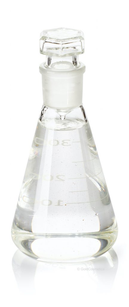 Erlenmeyer flask with serum and gold powder